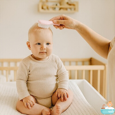 trousse-de-toilette-bebe-fille-rose-brosse